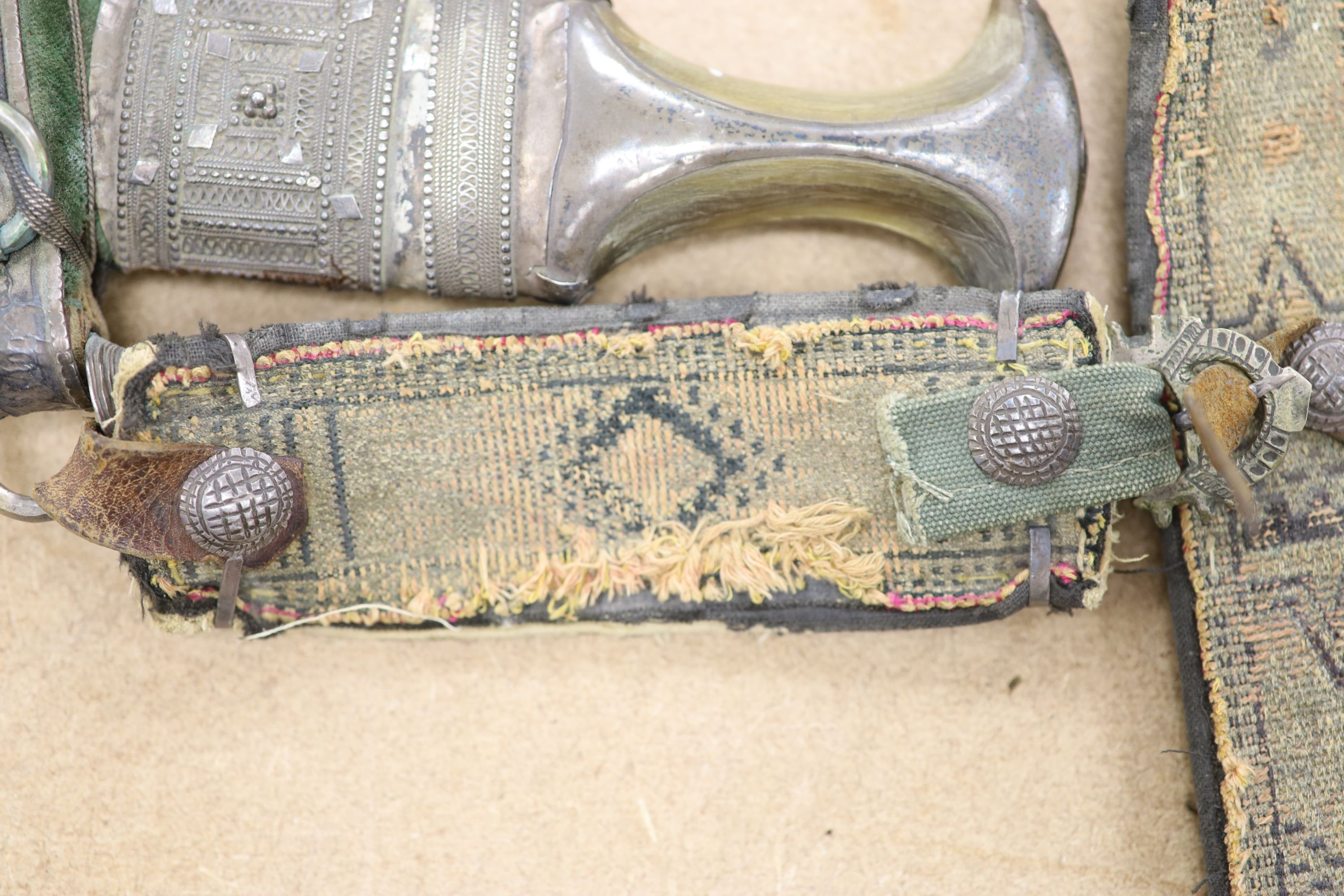 An Arab white metal Jambiya and a group of mainly Arab white metal items